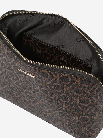 Calvin Klein Cosmetic Bag in Brown