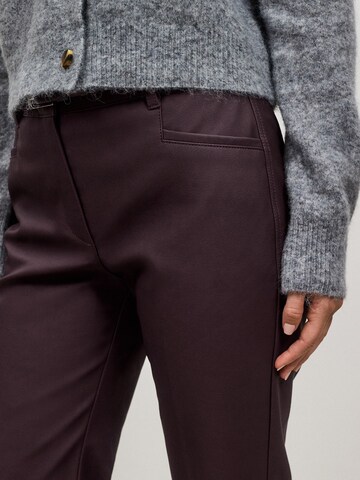 Flared Pantaloni con piega frontale di Next in rosso