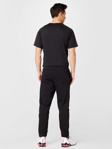 PUMA Zúžený Sportovní kalhoty – černá