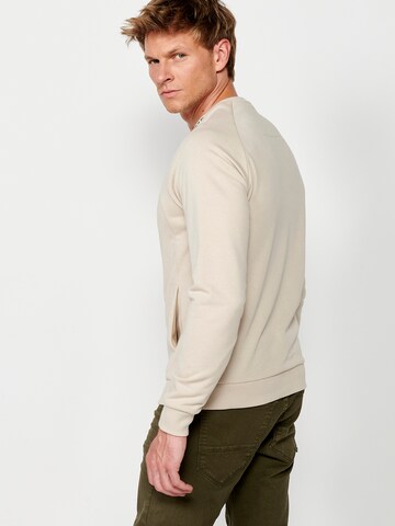 Felpa di KOROSHI in beige
