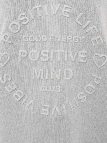 Zwillingsherz Sweatshirt 'Positive Mind' i grå