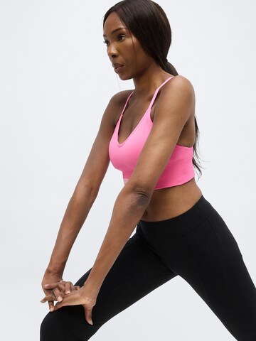 UNDER ARMOUR Bygelfri Sportbehå 'Vanish Seamless' i rosa