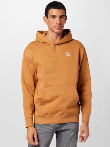 PUMA Sweatshirt 'Classics' in Bruin: voorkant