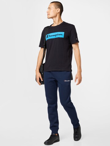 Champion Authentic Athletic Apparel Tapered Broek in Blauw