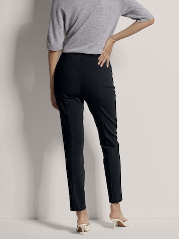 MADELEINE Slimfit Broek in Blauw