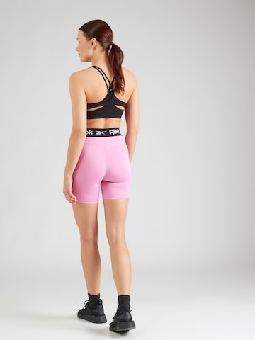 Reebok Skinny Sportnadrágok 'ID TRAIN' - rózsaszín