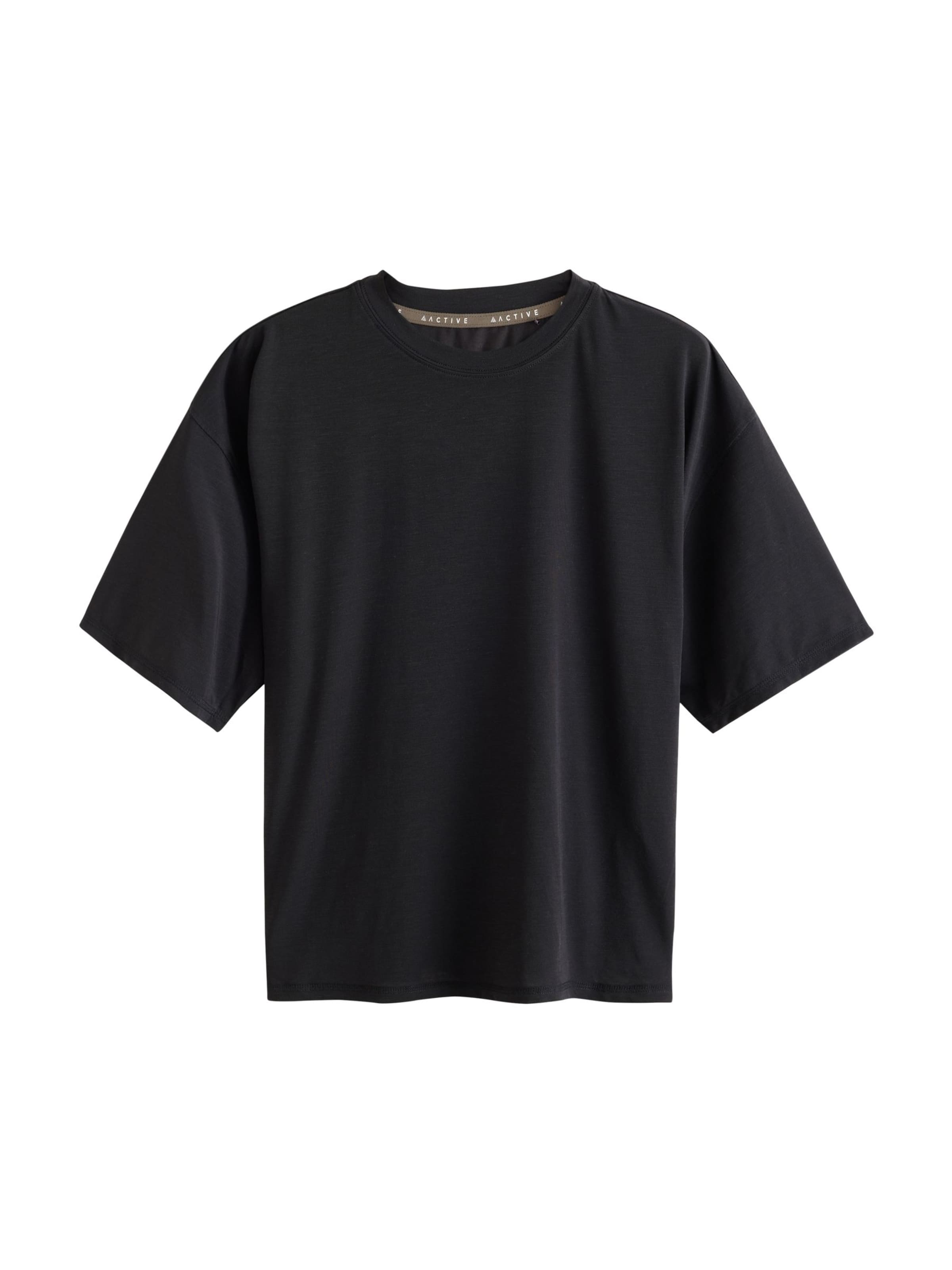 Next T-shirt i svart: framsida