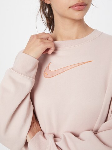 Nike Sportswear Sweatshirt 'Swoosh' in Roze