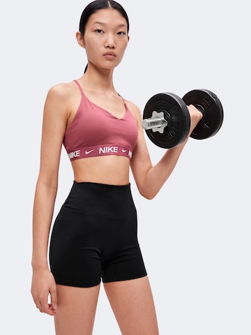 NIKE Bygelfri Sportbehå 'INDY' i rosa