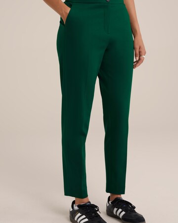 Coupe slim Pantalon à plis WE Fashion en vert : devant
