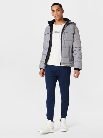 HOLLISTER Tapered Trousers in Blue