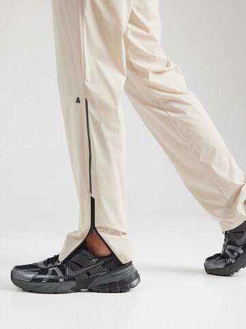 regular Pantaloni sportivi 'T_Active Move' di BOSS in beige
