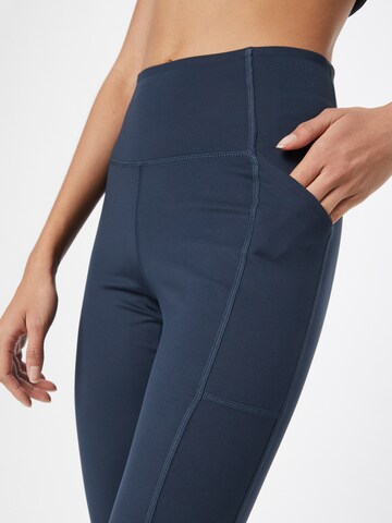 Girlfriend Collective Skinny Sporthose in Blau