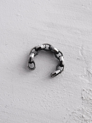 REYTEL - Pendientes 'MAKT' en plata: frente