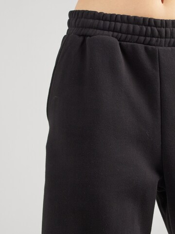 Wide leg Pantaloni di WEEKDAY in nero