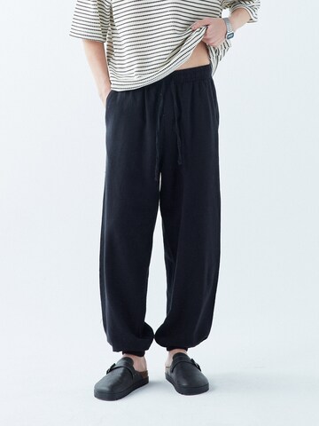 VAMOS CLO Loosefit Bukser 'La Marque' i sort: forside