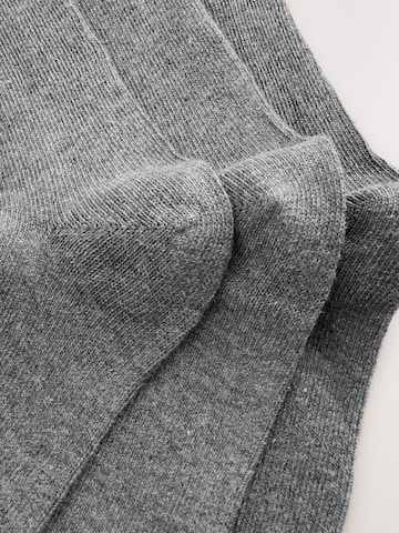 Chaussettes Next en gris