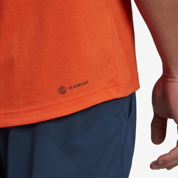 ADIDAS SPORTSWEAR Функционална тениска 'Designed To Move Logo' в оранжево