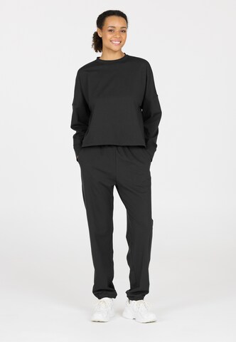 Athlecia Sports sweatshirt in Black