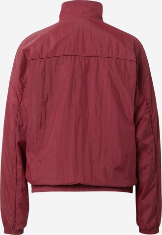 ADIDAS ORIGINALSPrijelazna jakna 'Premium Essentials Nylon' - crvena boja