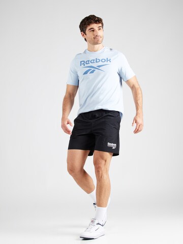 Reebok Regular Sportshorts 'BRAND PROUD' in Schwarz