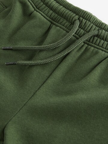 Next Tapered Housut värissä vihreä