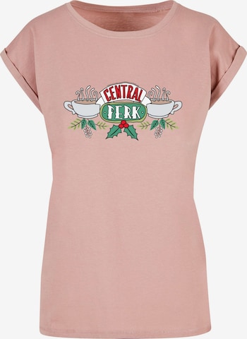 ABSOLUTE CULT T-Shirt 'Friends - Festive Central Perk' in Pink: predná strana