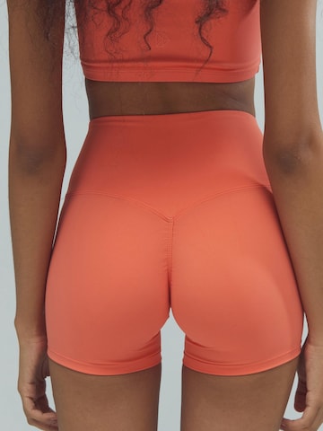 DRILLS Apparel Skinny Leggings 'ACTIVE Scrunch Shorts' in Orange