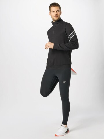 new balance Skinny Spodnie sportowe 'Accelerate' w kolorze czarny