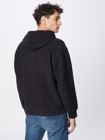 LEVI'S ® Regular Fit Sweatshirt 'Relaxed Graphic Hoodie' in Schwarz