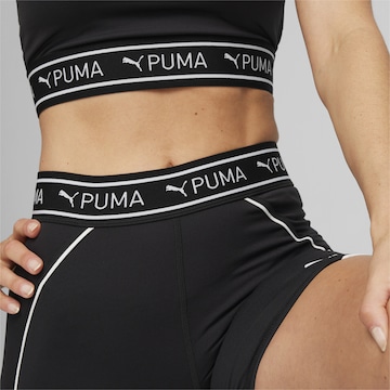 PUMA Skinny Sportovní kalhoty 'TRAIN STRONG 5' – černá