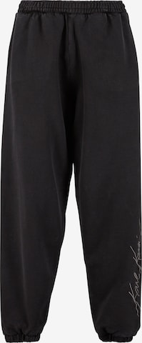 Effilé Pantalon 'Autograph' Karl Kani en noir : devant
