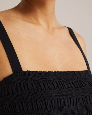 Rochie de la WE Fashion pe negru