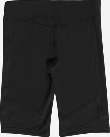 Skinny Pantaloni sport de la NIKE pe negru