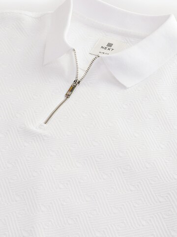 T-Shirt Next en blanc
