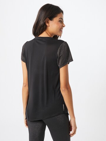PUMA Functioneel shirt 'Studio' in Zwart