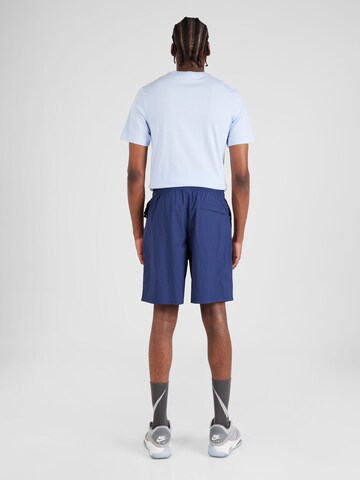 Regular Pantaloni 'Solo' de la Nike Sportswear pe albastru