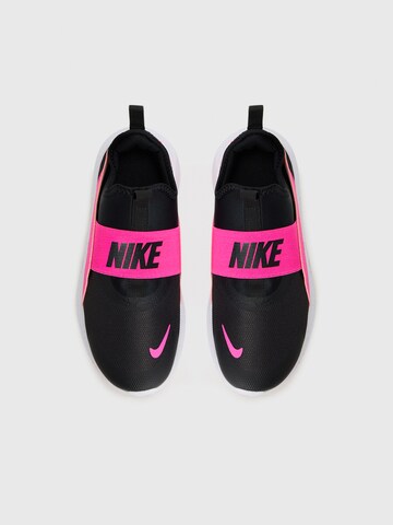 Scarpa sportiva 'FLEX RUNNER 4' di NIKE in nero