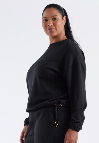 Q by Endurance Sportief sweatshirt 'Karina' in Zwart: voorkant