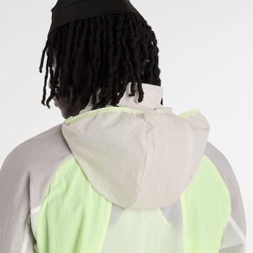 Veste de sport new balance en jaune