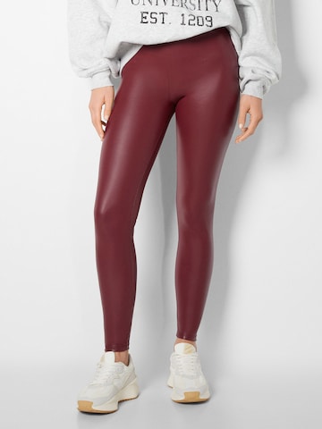 Bershka Skinny Leggings in Red: front