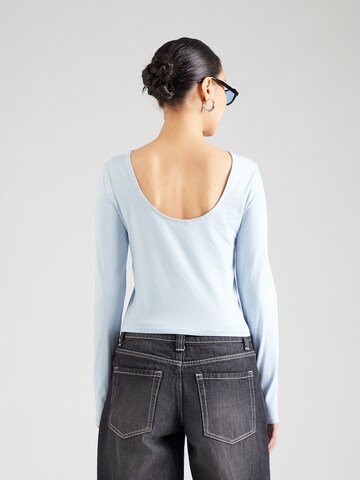 ONLY - Camiseta 'ONLKISS' en azul