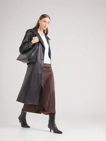 Pullover di monari in bianco