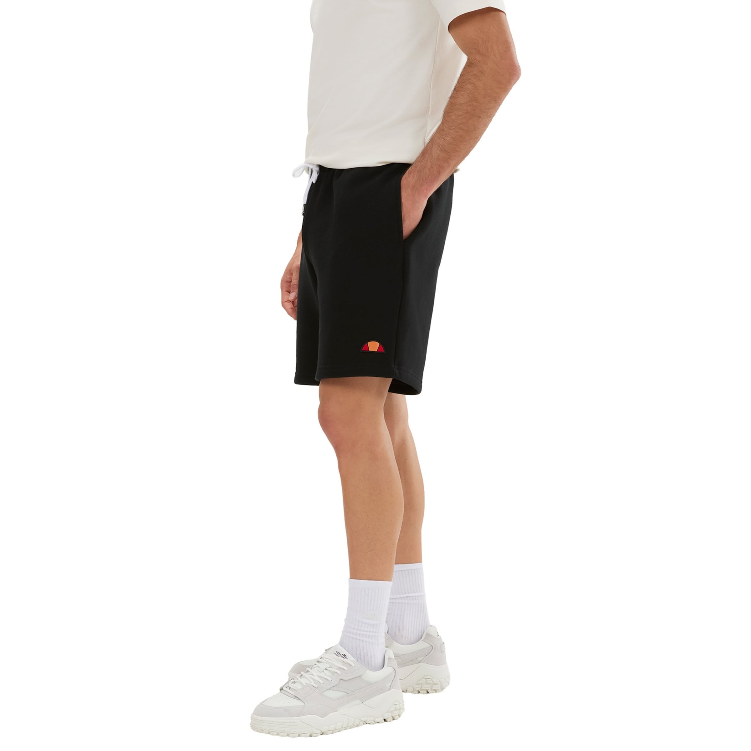 ELLESSE Regular Trousers in Black