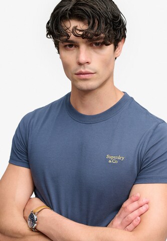 Superdry & Co Тениска 'Essential Serif' в синьо