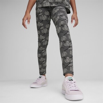PUMA Skinny Leggings in Black: front