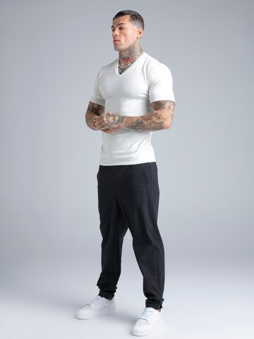 Maglietta di SikSilk in beige