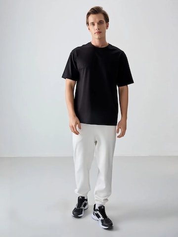 Tommy Life T-Shirts in Schwarz