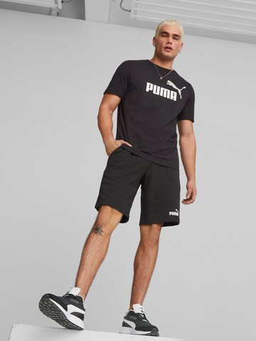 PUMA Sportshirt 'Essentials' in Schwarz