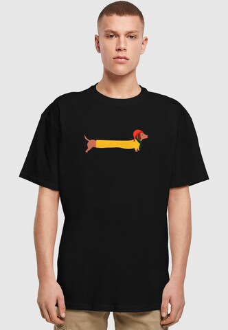 Merchcode Koszulka 'Christmas Dog' w kolorze czarny: przód